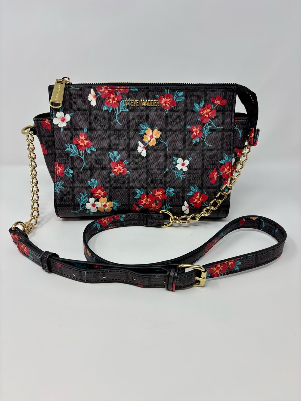 Steve Madden Black Floral Logo Pattern Purse. Gold Hardware Adjustable Strap